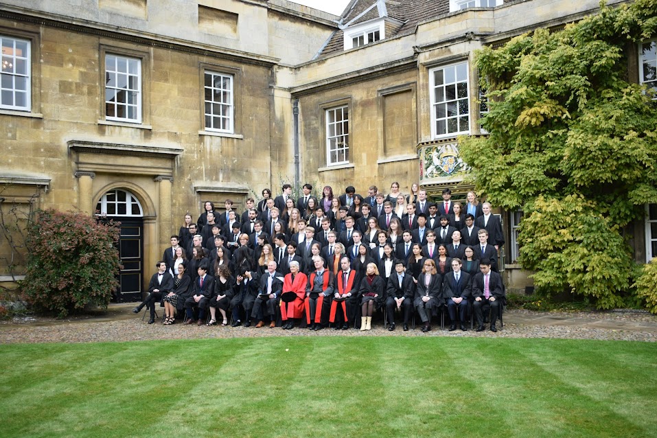 Large group photo taken in first court