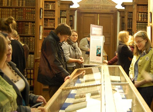 Image of visitors to 2008 exhibition in the Old Library about John Milton