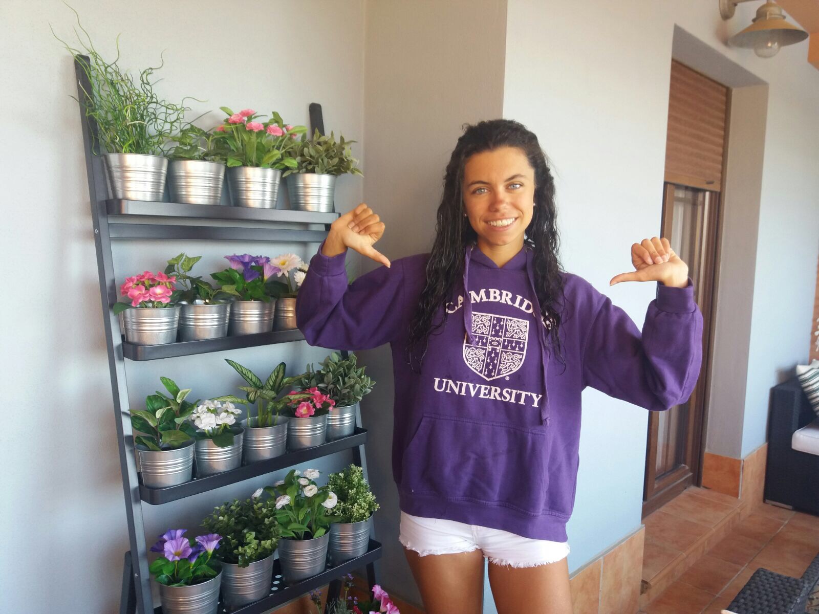 Maria in a Cambridge sweatshirt