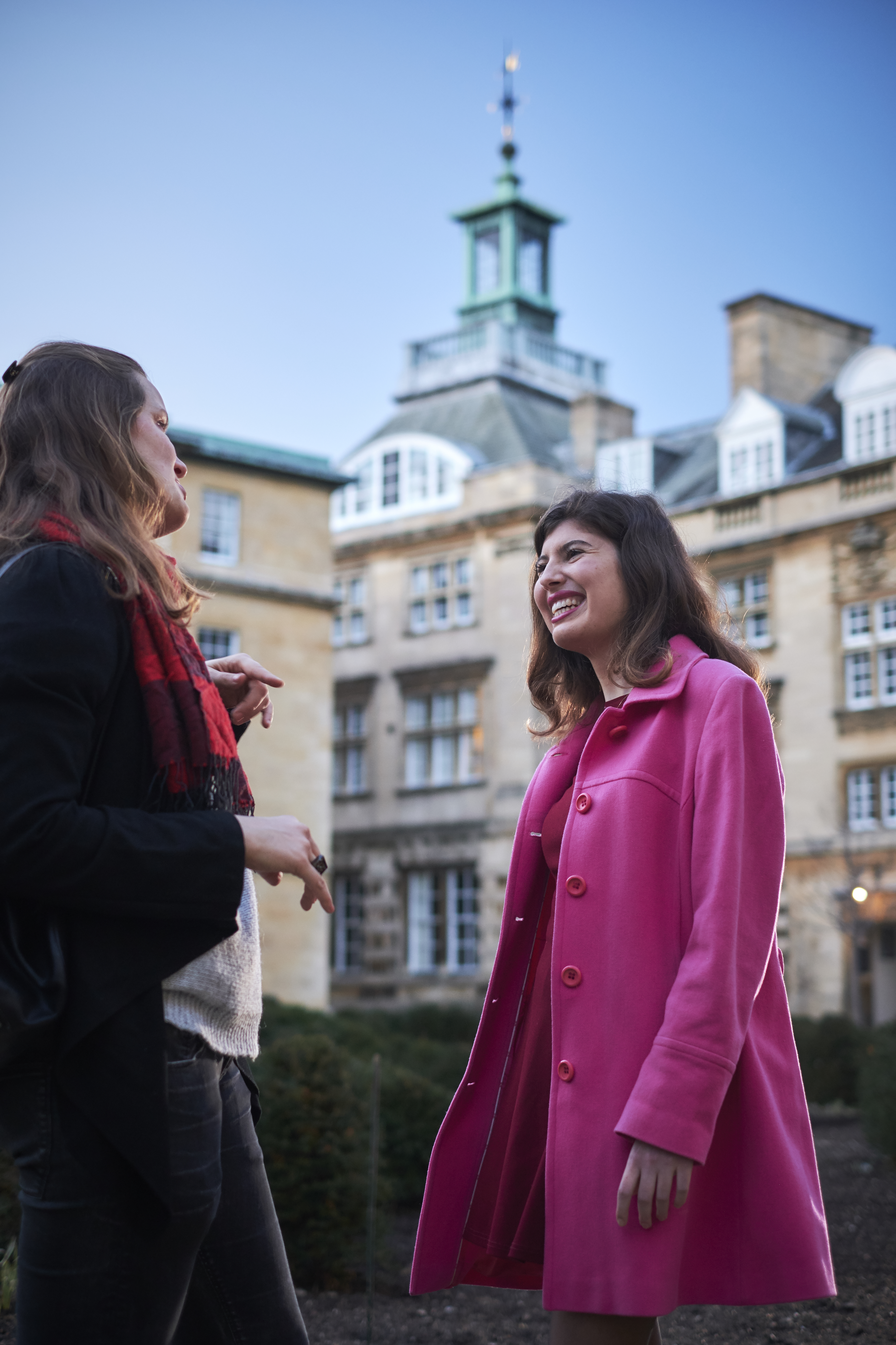 Two students talking in Third Court