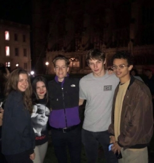 Eebbaa and four friends in the First Court of Christ's College, Cambridge, at night.