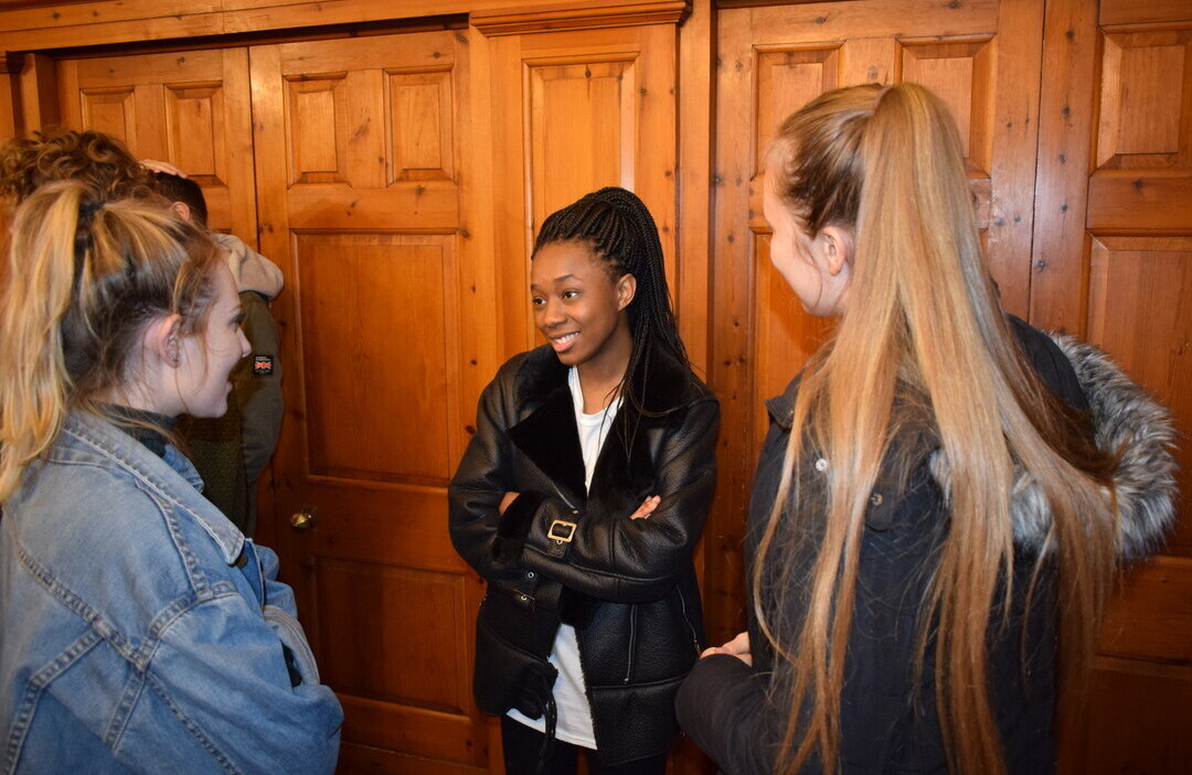 Three students talking