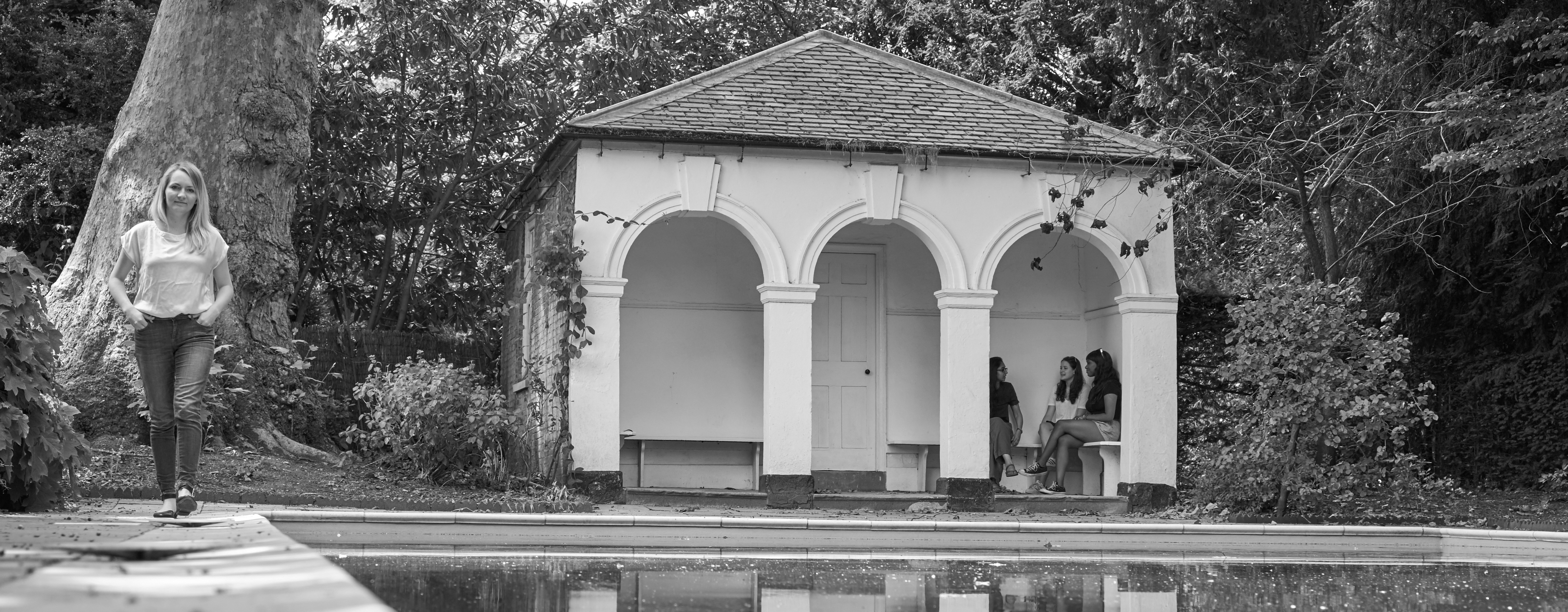 Students by the swimming pool