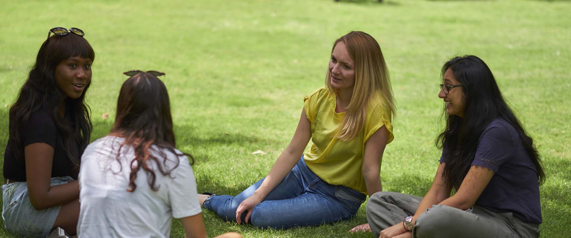 Group seated on lawn