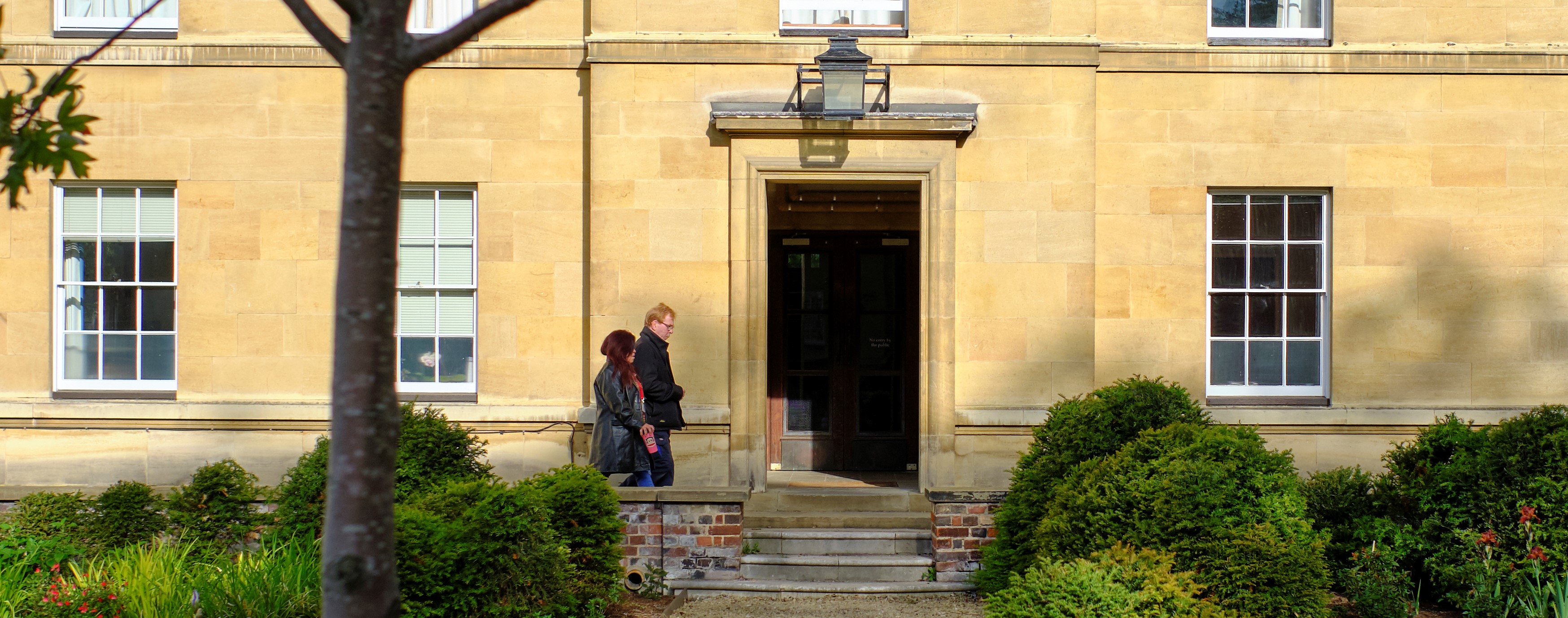 Students walking pas the Blyth Building