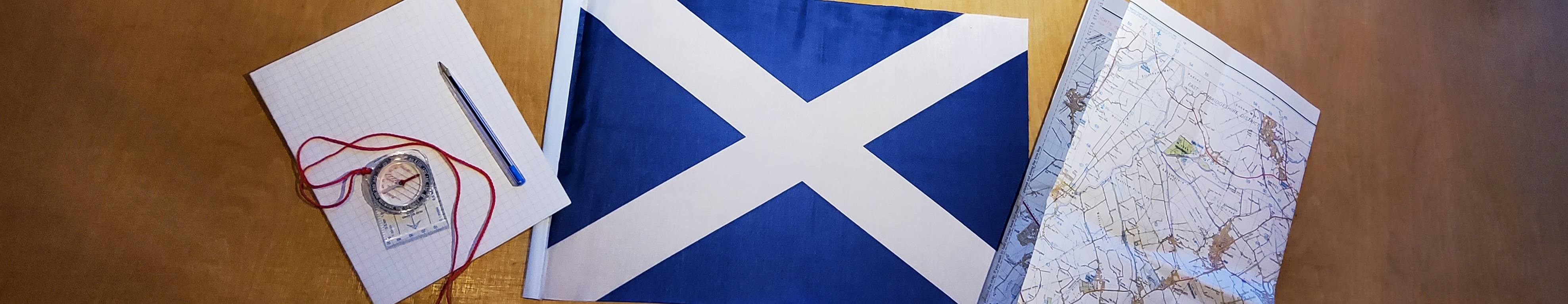 Scotland flag with map and compass