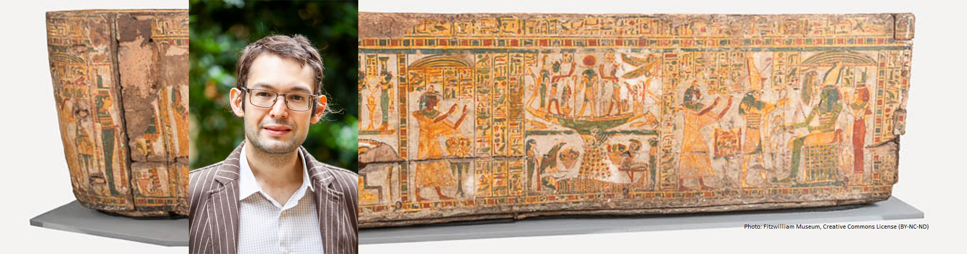 Side view of an Egyptian Coffin with headshot of Dr Loktionov