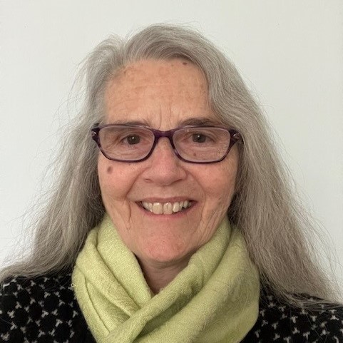 Person wearing scarf and glasses