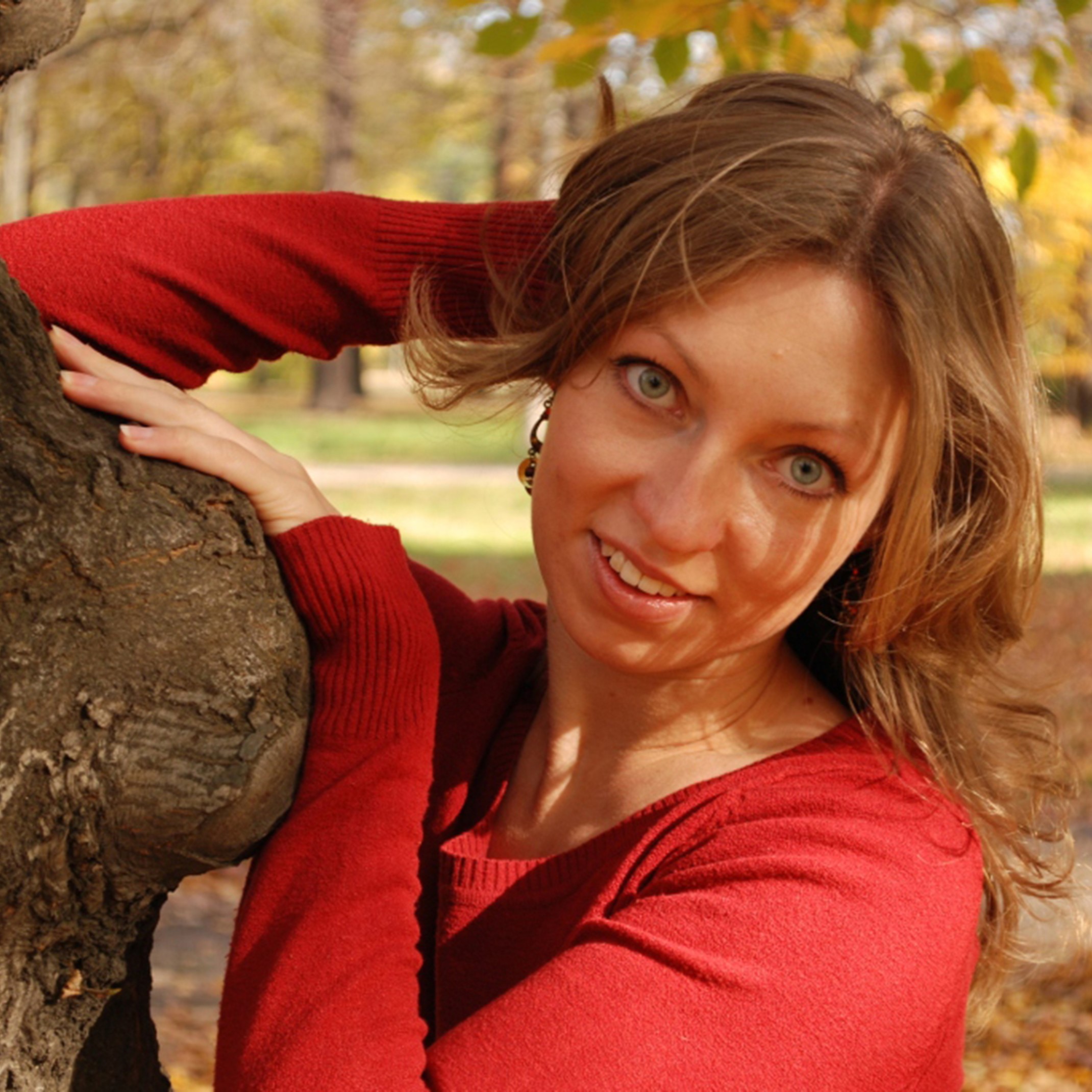 Headshot of Maria Rostovskaya wearing a red jumper