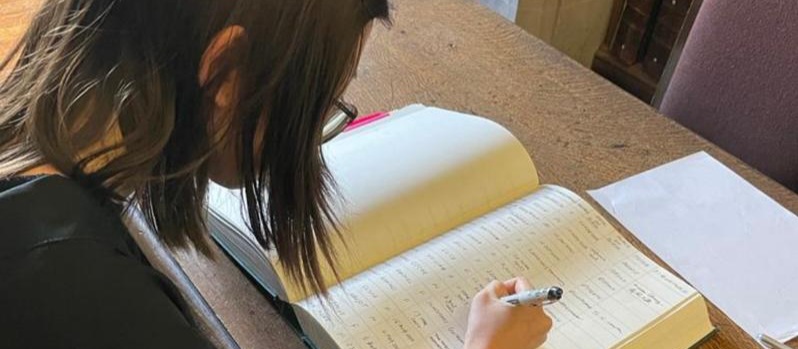 Signing the matriculation book