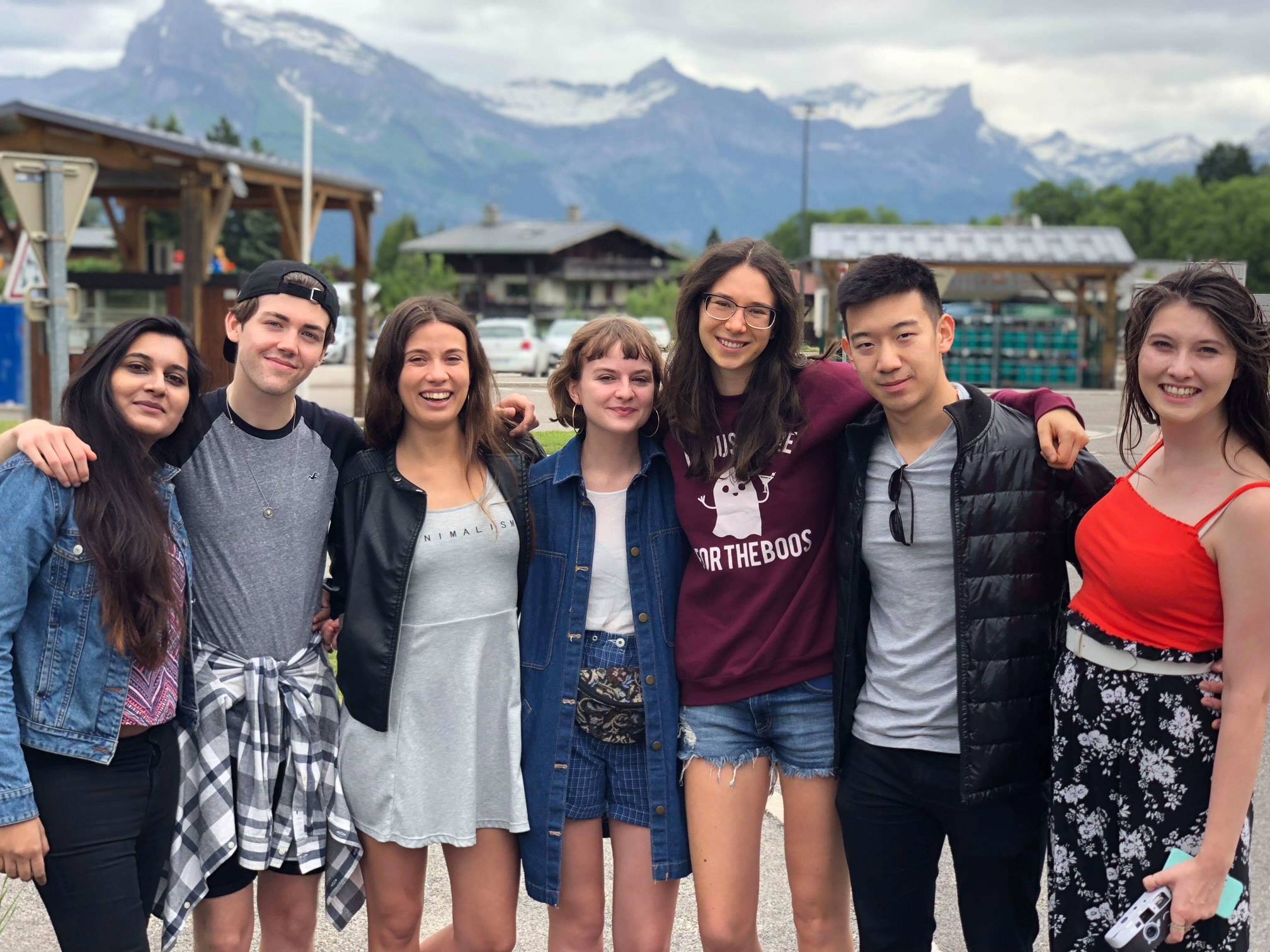 Group on holiday, with mountains in background