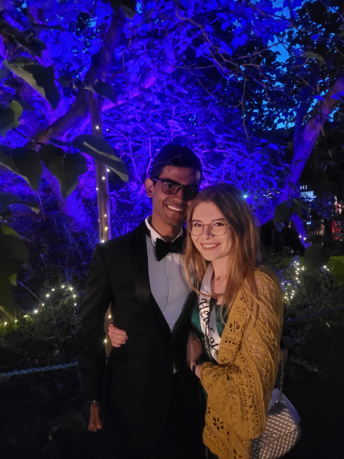 Two students in very blue lighting