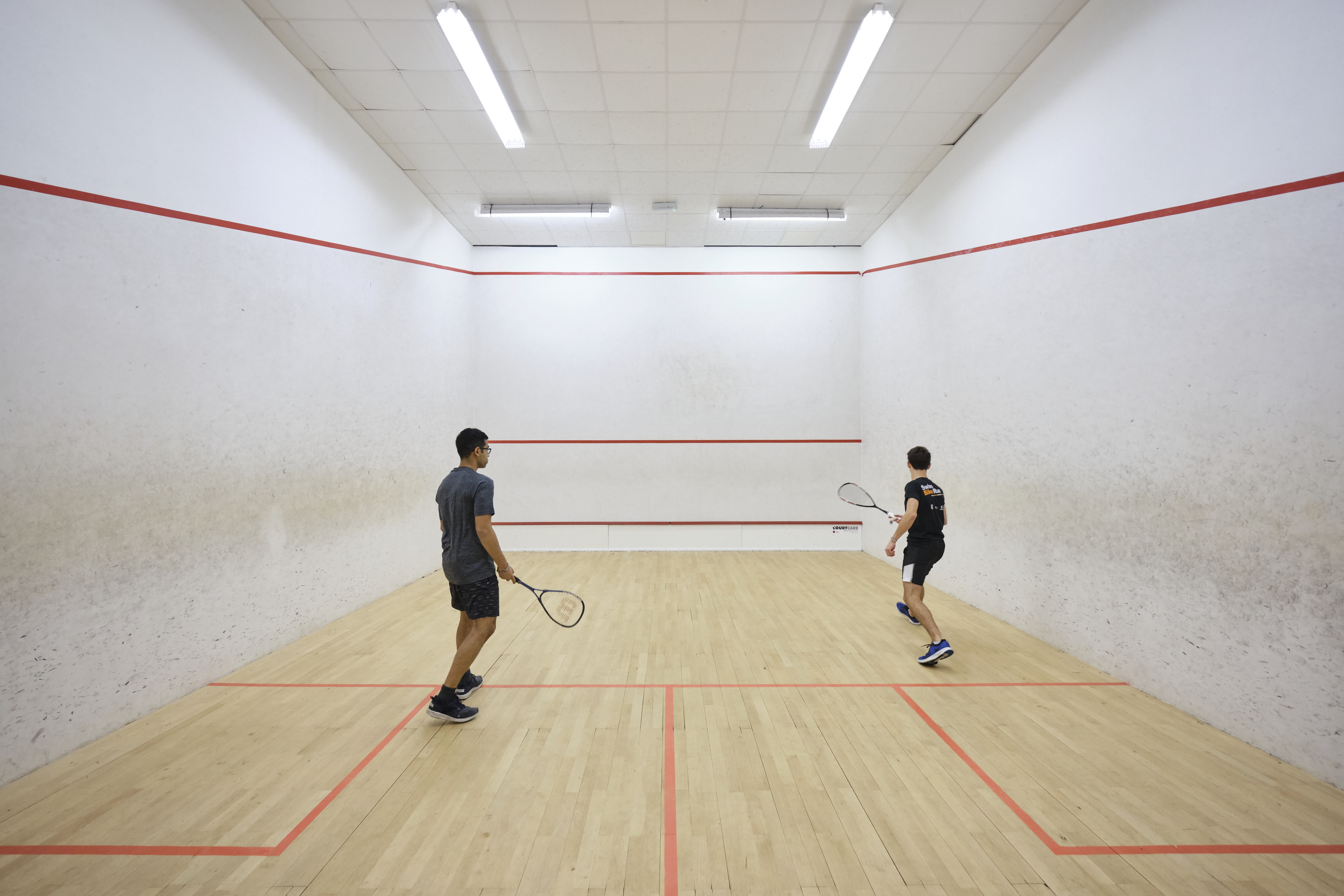 Students playing squash