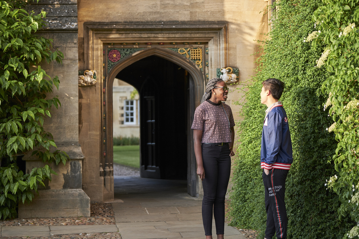 Two students talking in First Court