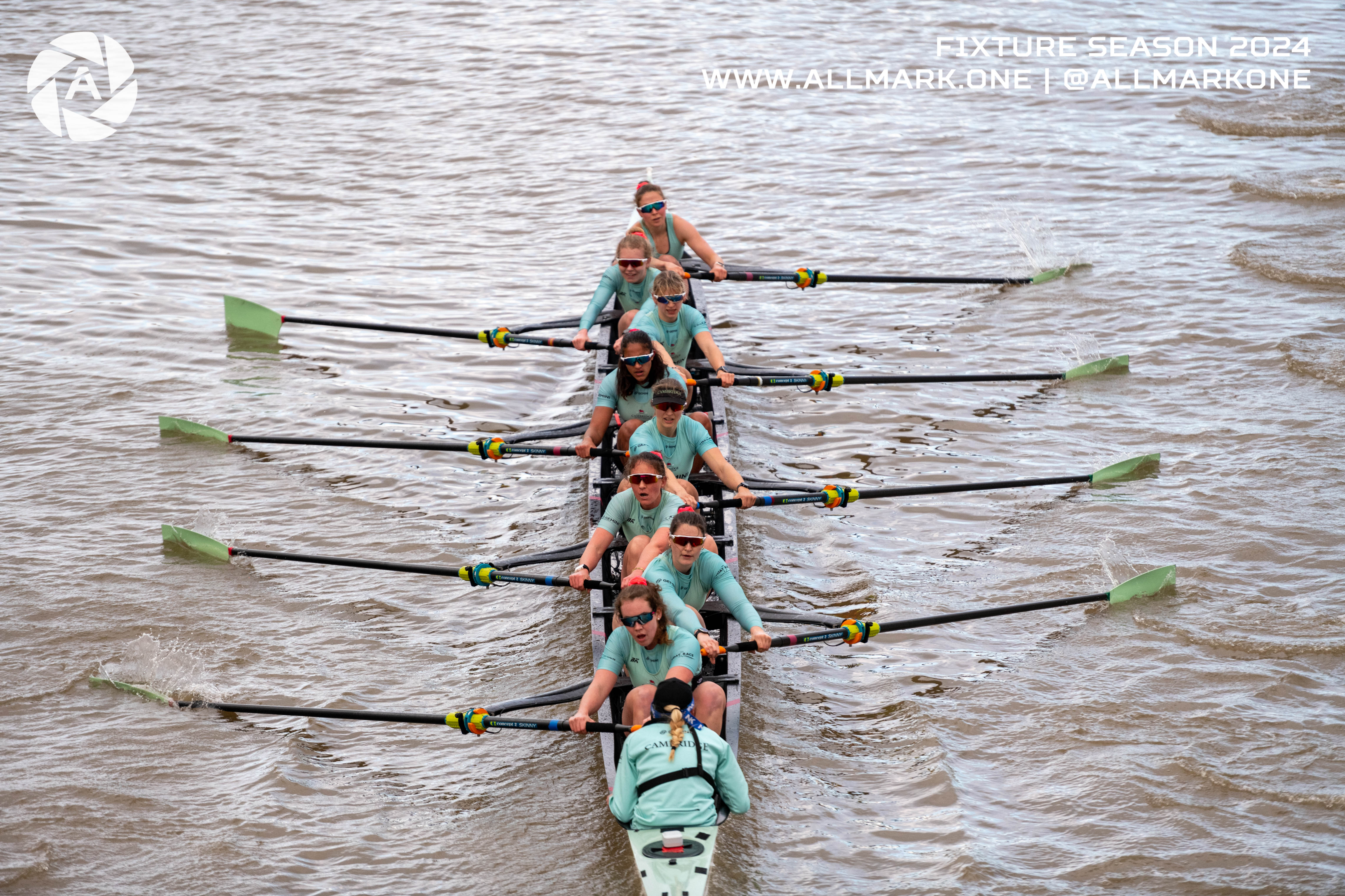 Rowing boat from above with 8 rowers and the cox