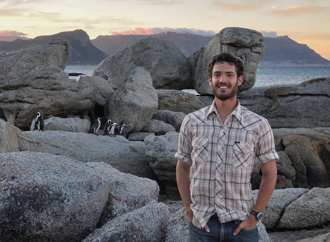 Daniel Field with penguins
