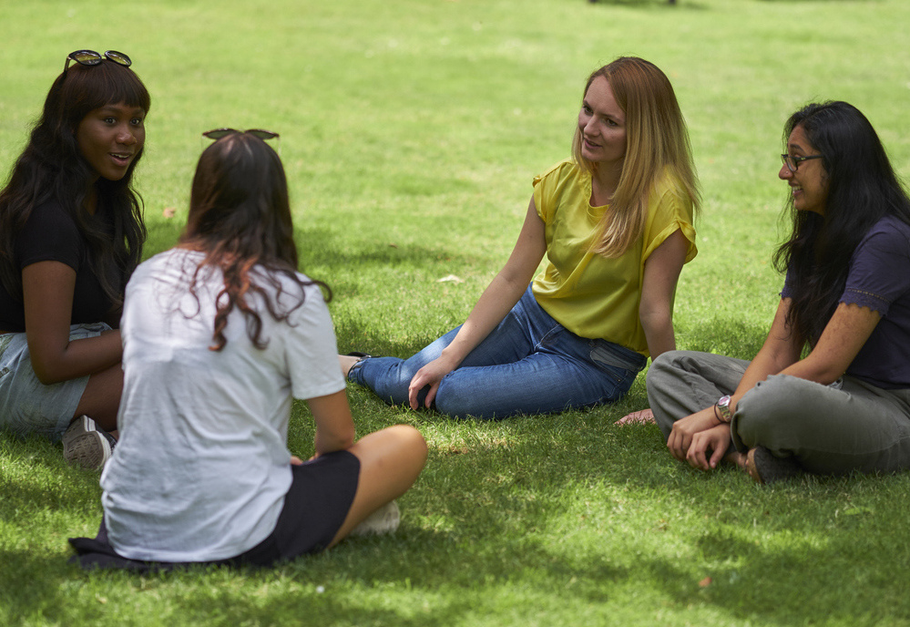 Students chatting in the Fellows Garden