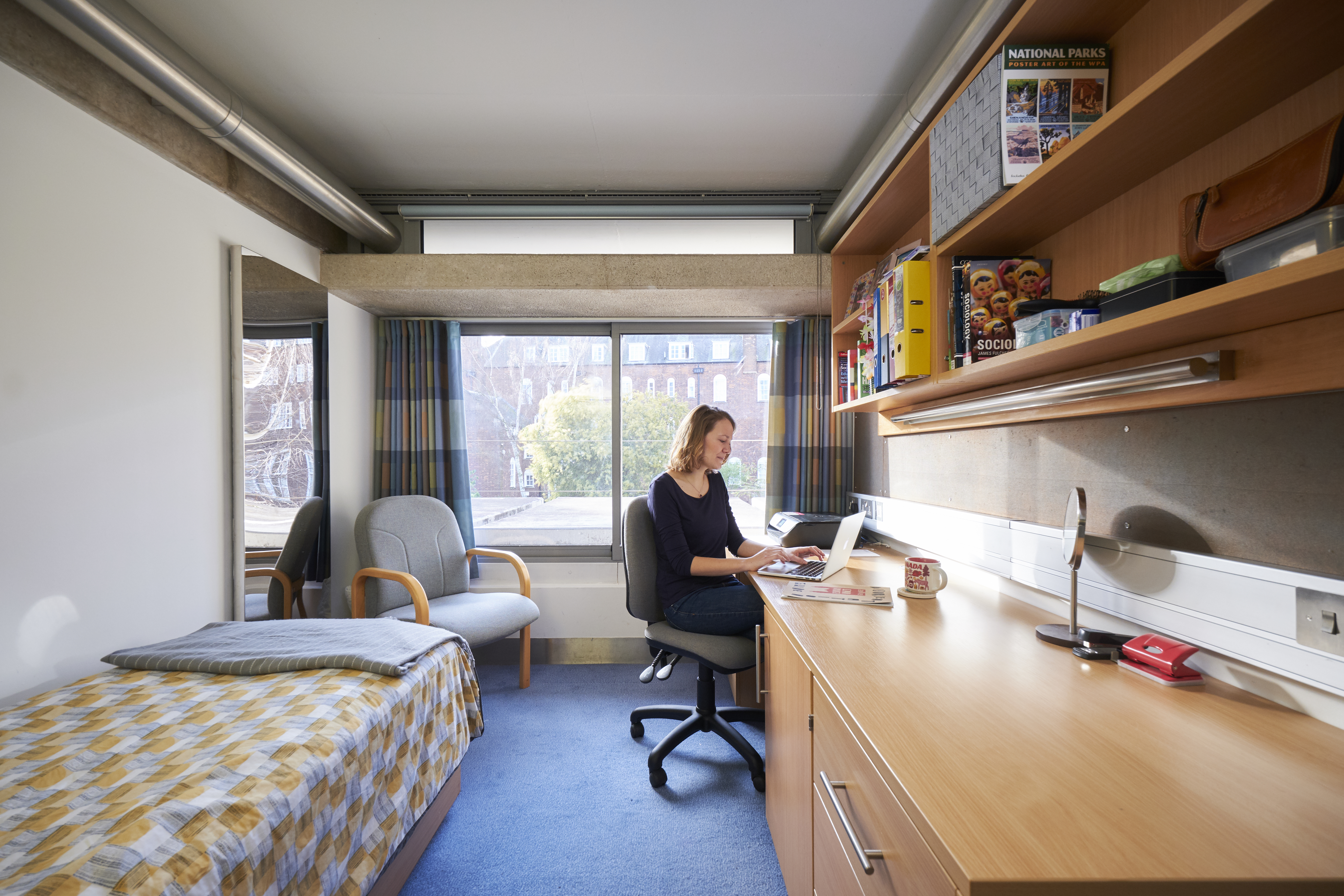 Student at desk with laptop