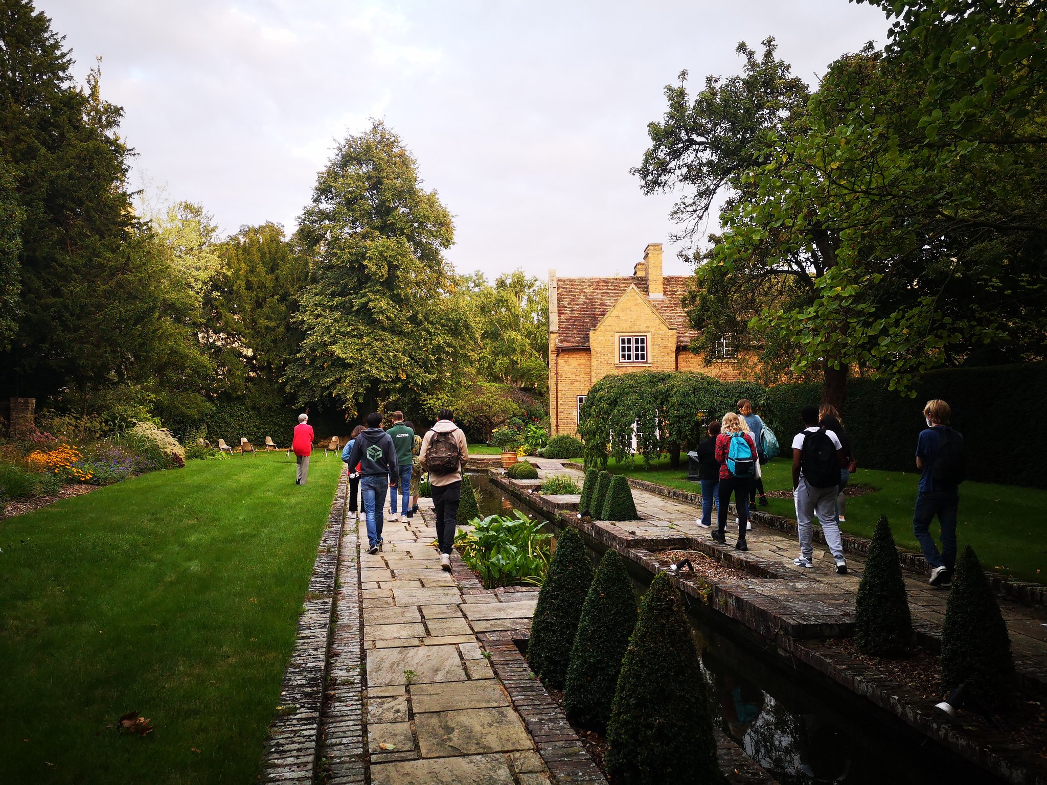 Students in the Master's garden at Christ's