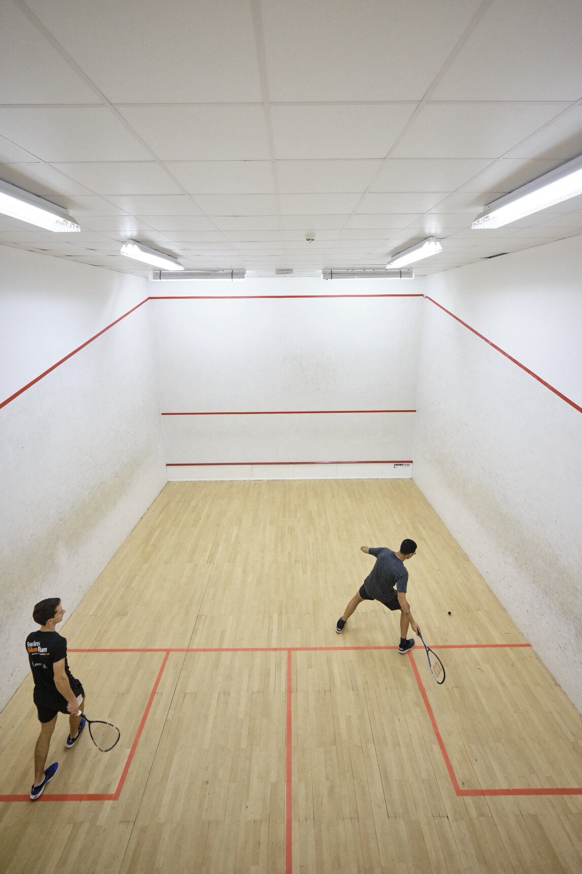 Christ's College, Cambridge playing squash