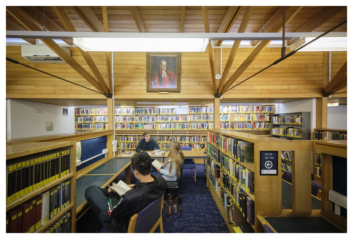 Students at desks in library