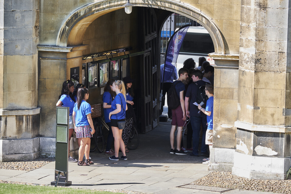 Group of students in main gate archway