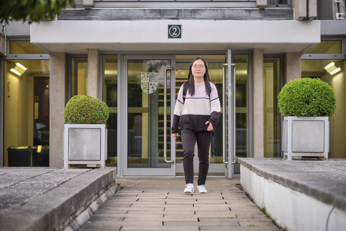 Female student leaving staircase 2