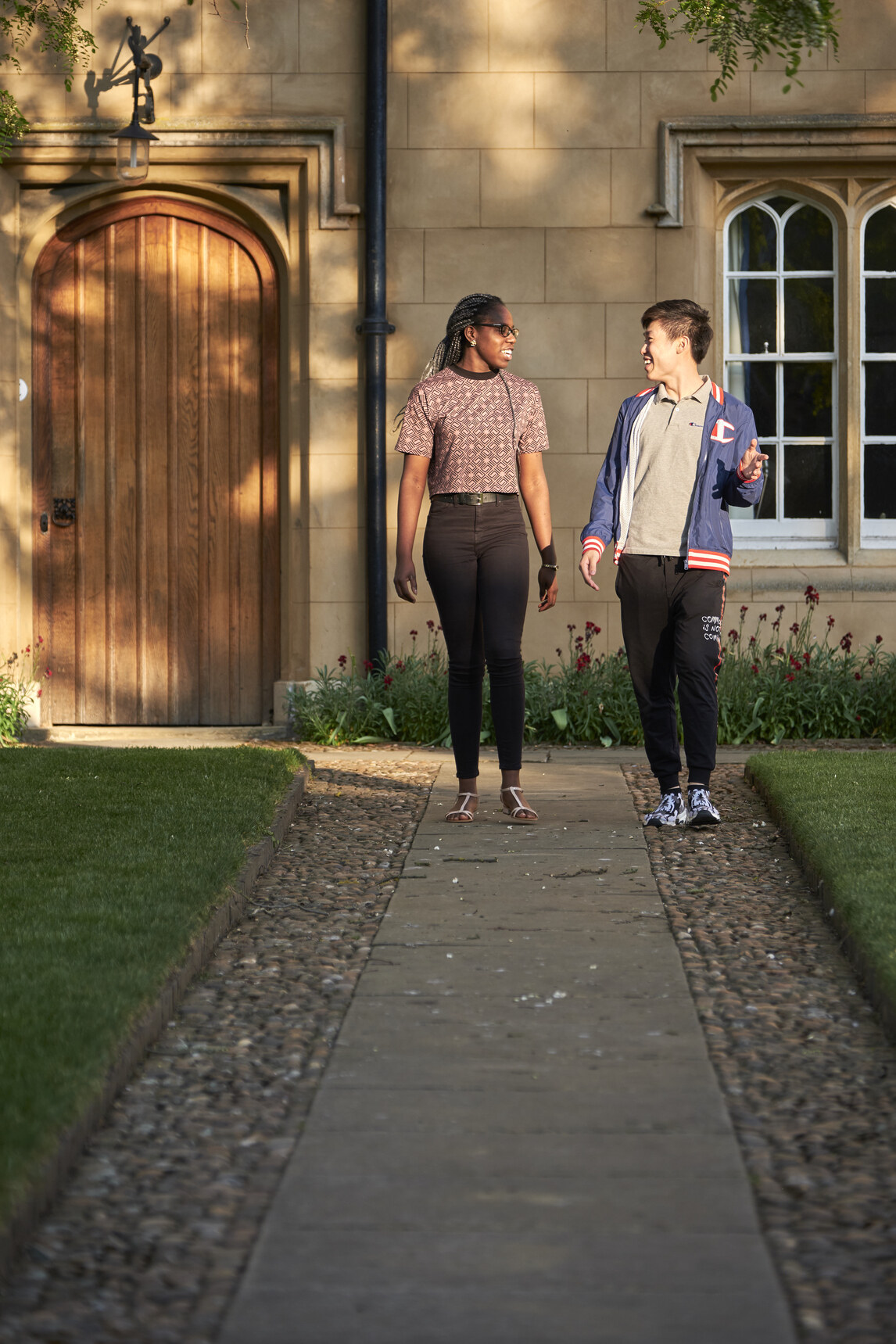 Two students walking and talking