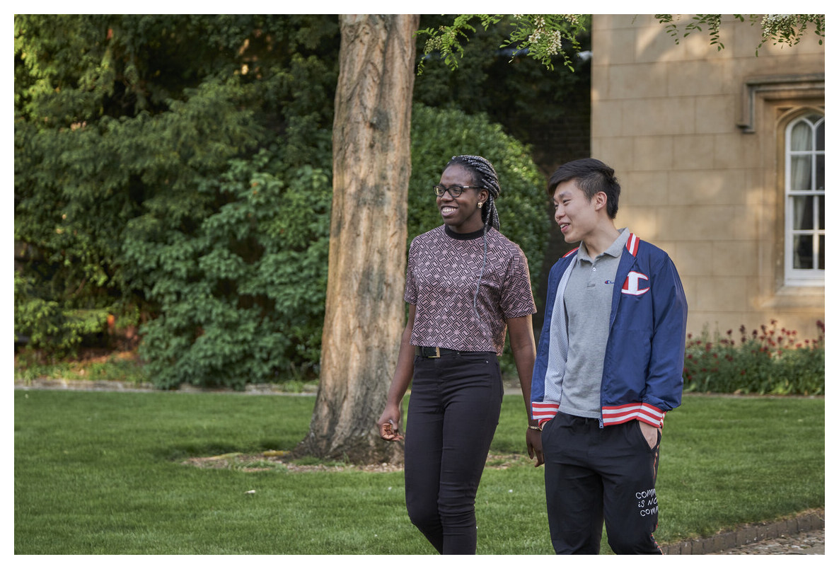 2 students walking through Second Court