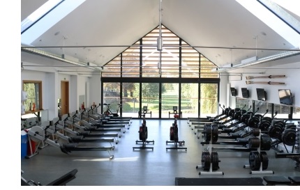The interior of the gym at the Christ's College Boathouse, Cambridge.