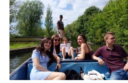A group of students on a punt on the River Cam
