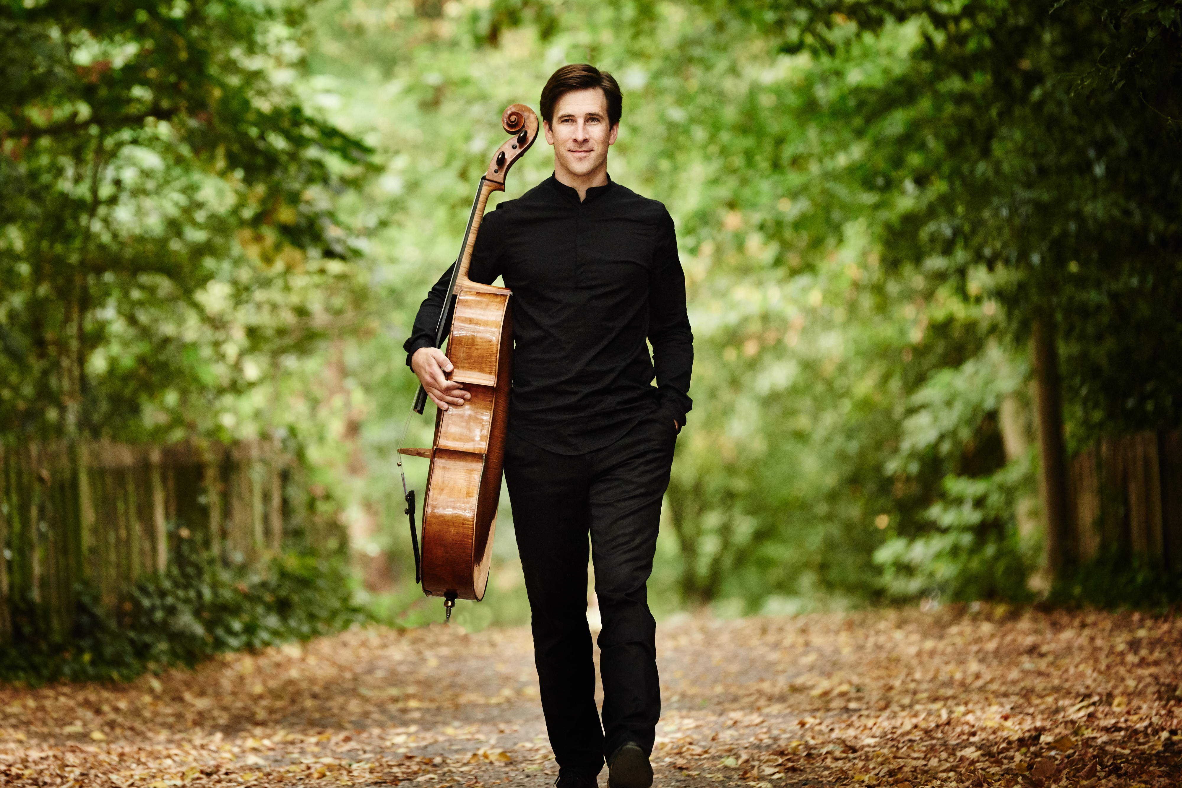 Guy Johnson holding a cello