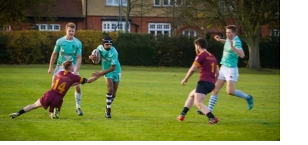 Rugby players in mid-game, in an intercollegiate match at the University of Cambridge.