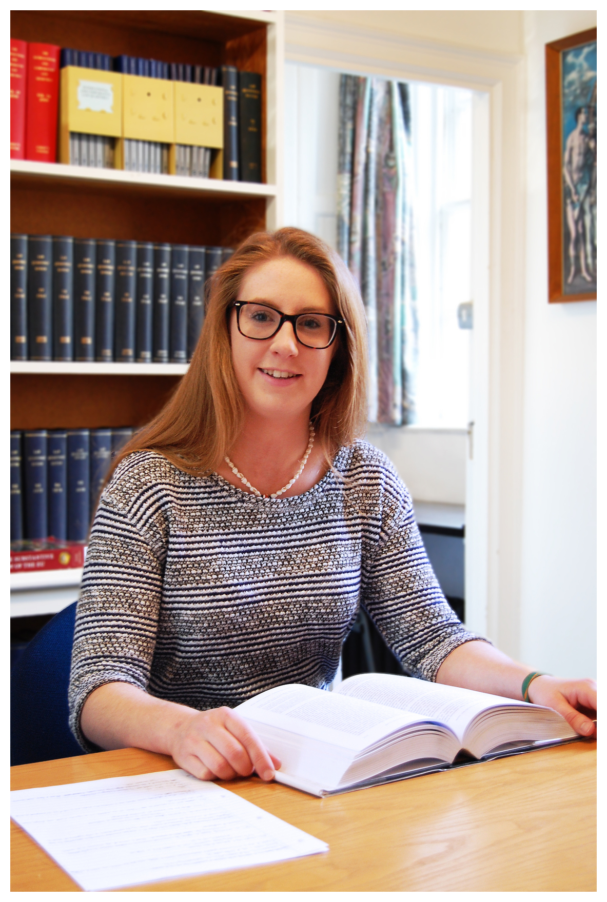 Student at desk in the Law Library