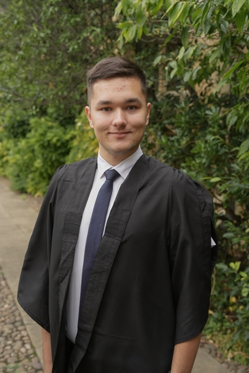 Emilijus in his gown on Matriculation Day