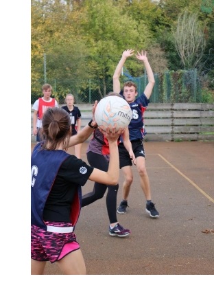 Students in the middle of a netball match