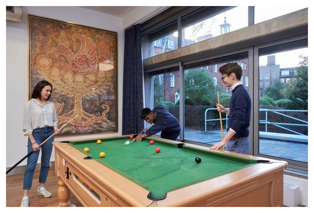Students playing pool in the JCR