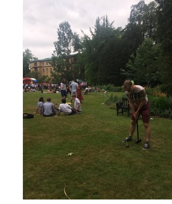 Students playing croquet at the annual Christ's College Garden Party.