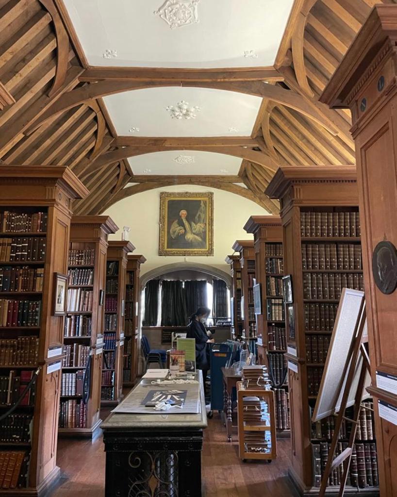 View of the old library, with shelves and old hardback books