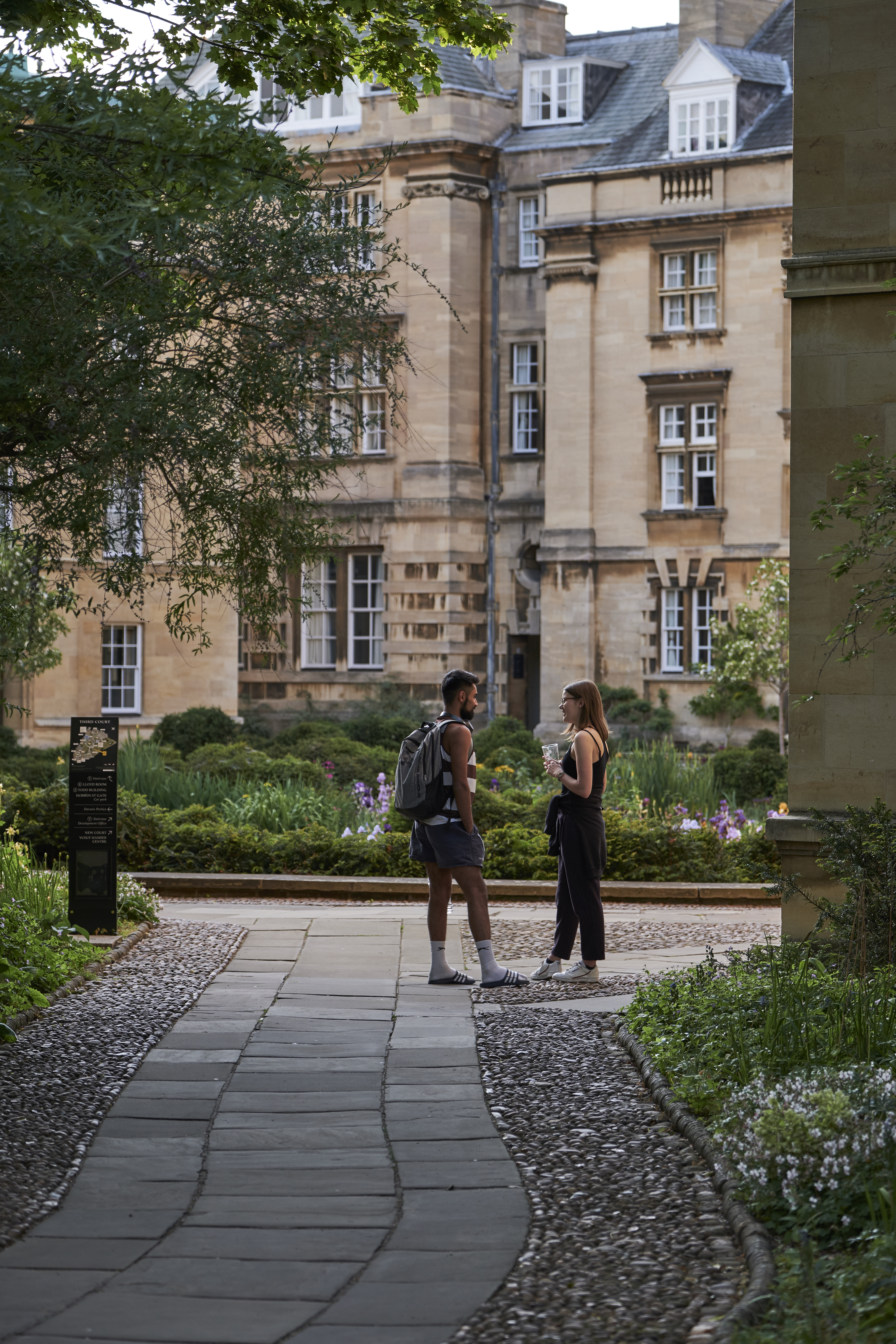 Students chatting on the path to Third Court