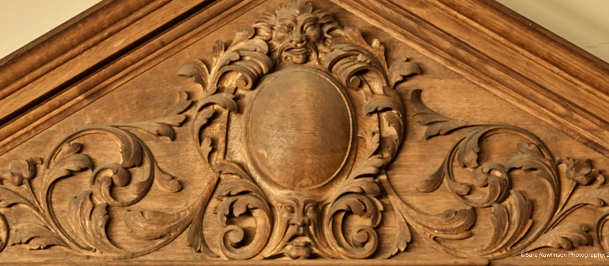 Wooden detailing above door in the Old Library