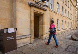 Person entering Third Court Library