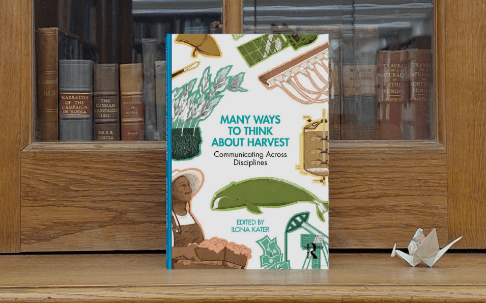 Book cover against a book case