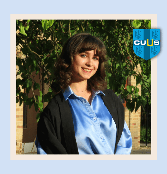 Headshot of Diana Shypovych with shield of CUUC