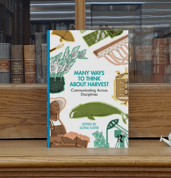 Book cover against a book case