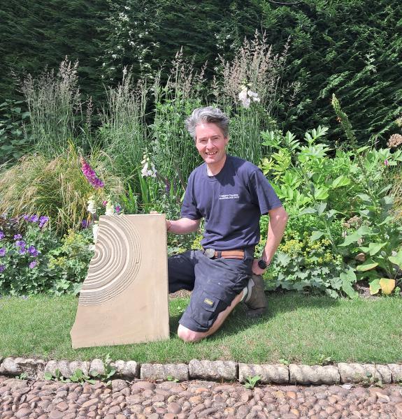 Matthew with the sculpture