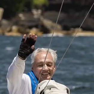 Headshot of David Jones waving